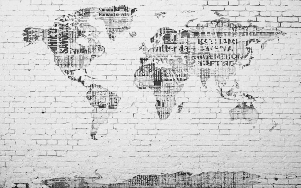 Фотообои Карта мира на кирпичной  стенке